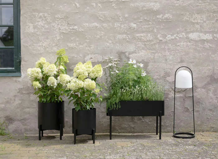 Eva Solo Simply Grow. Elegant self-watering planters for your garden.